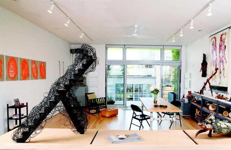 Jim’s studio includes sculptures, drums, yoga ropes and work from a recent community-based art project.